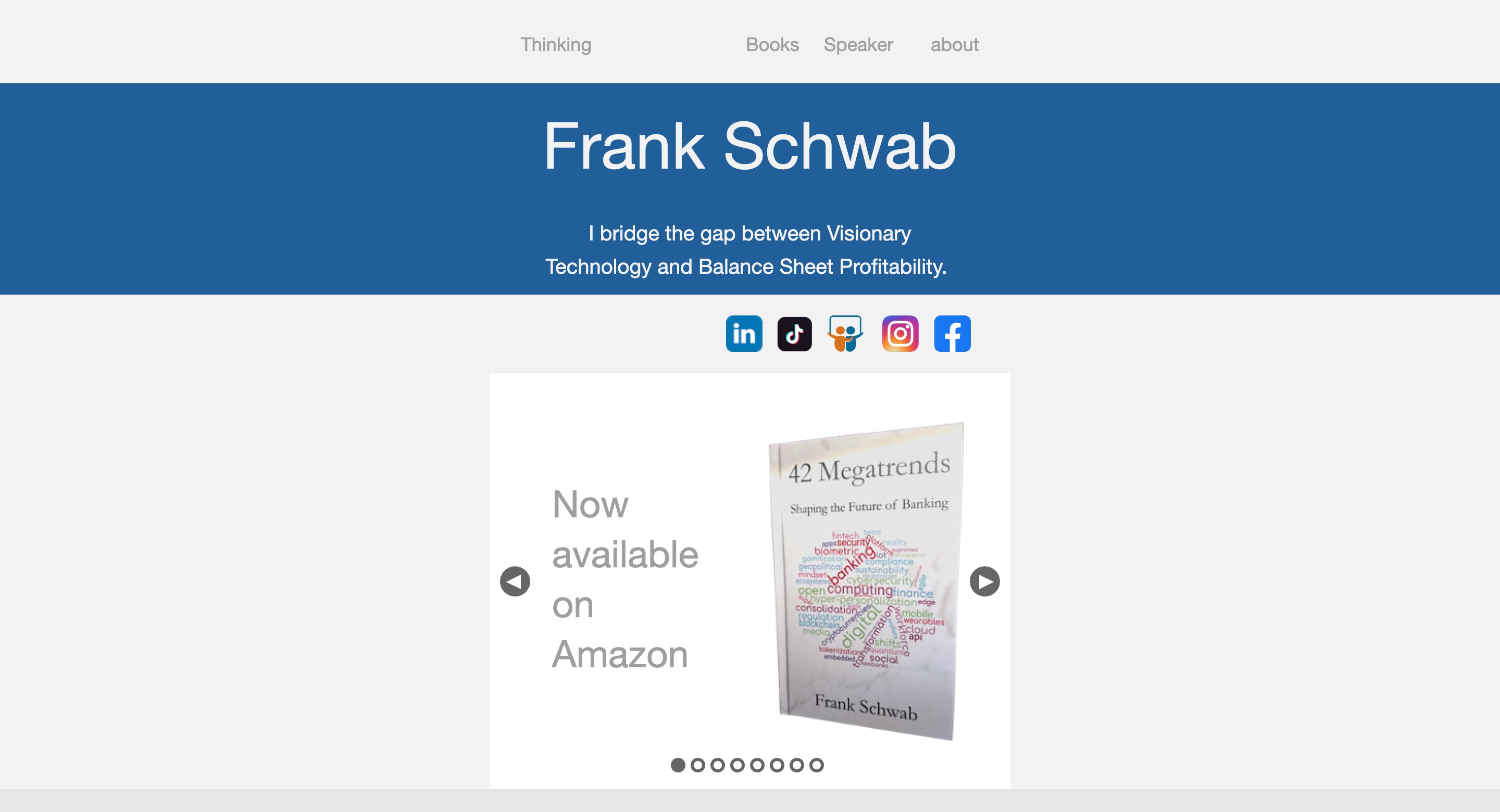 The old homepage, January 2026: his name on a blue banner, a slogan, social icons and a book slider.